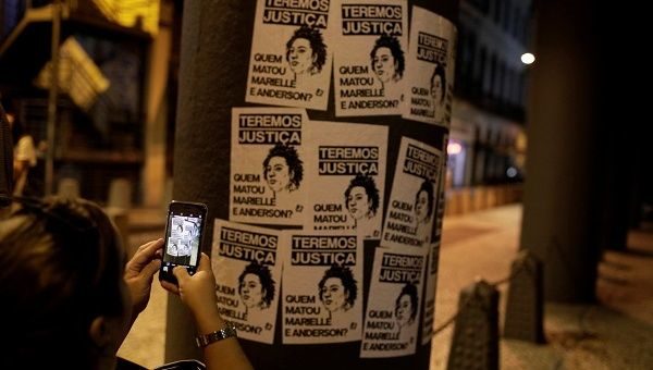 Protest placards shooting Marielle Franco Brazil