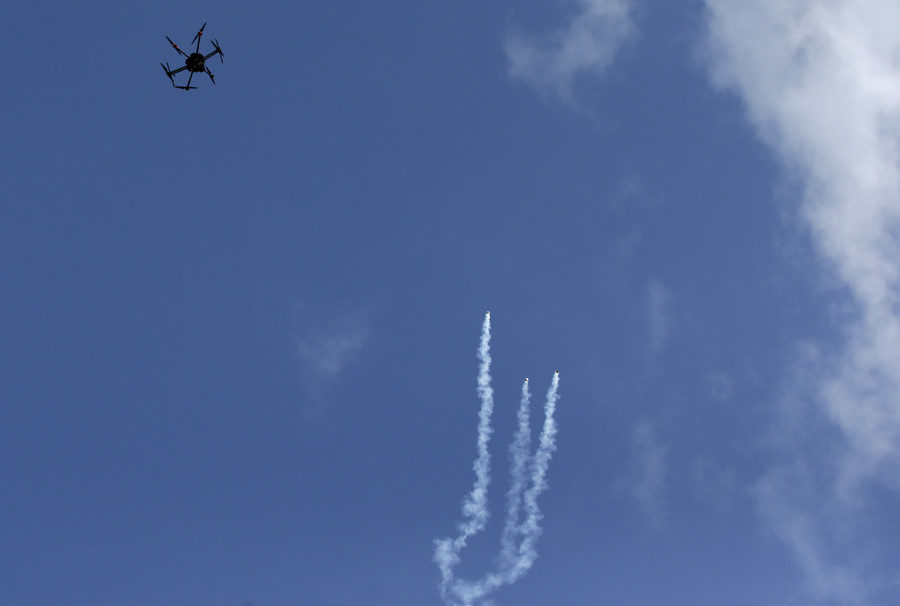 Click to enlarge Israeli drone dropping tear gas grenades