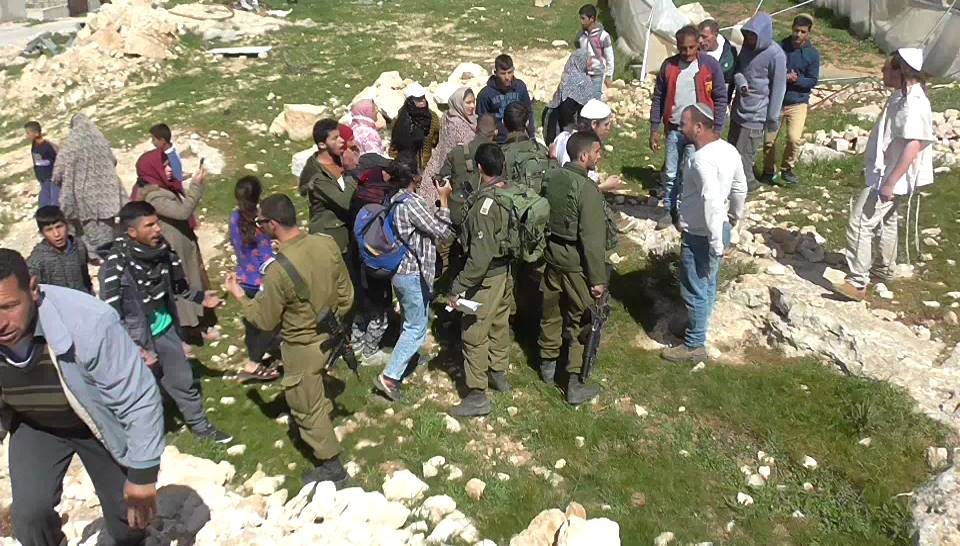 Click to enlarge Havat Ma’on armed illegal settlers