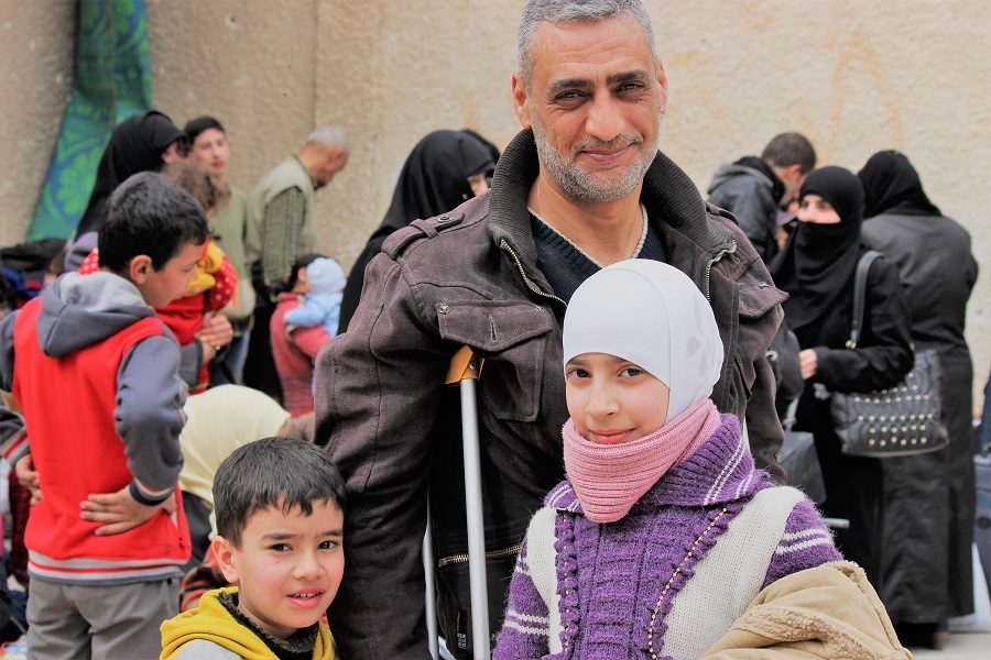 Click to enlarge syrian family happy