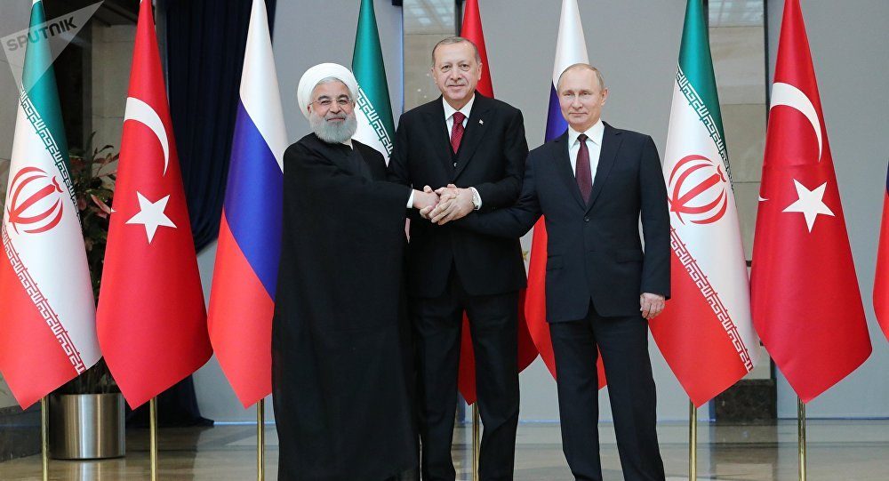 Click to enlarge The presidents of Russia, Turkey and Iran - Vladimir Putin, Recep Tayyip Erdogan and Hassan Rouhani