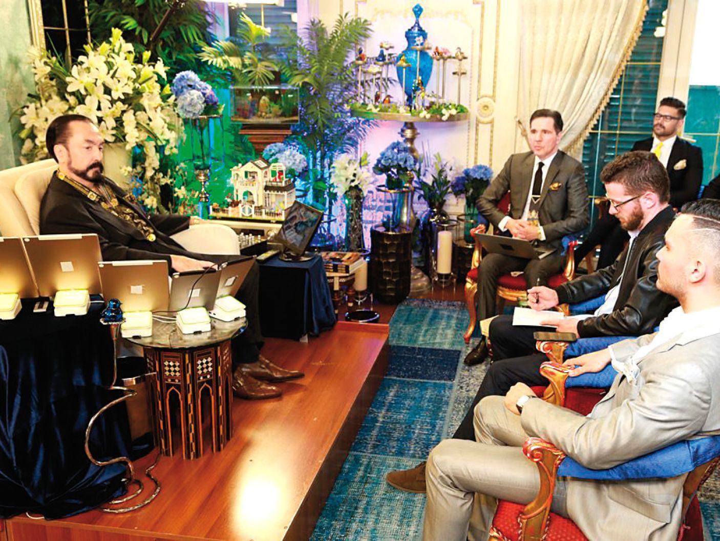 Click to enlarge Adnan Oktar hosts the author at his TV studio.