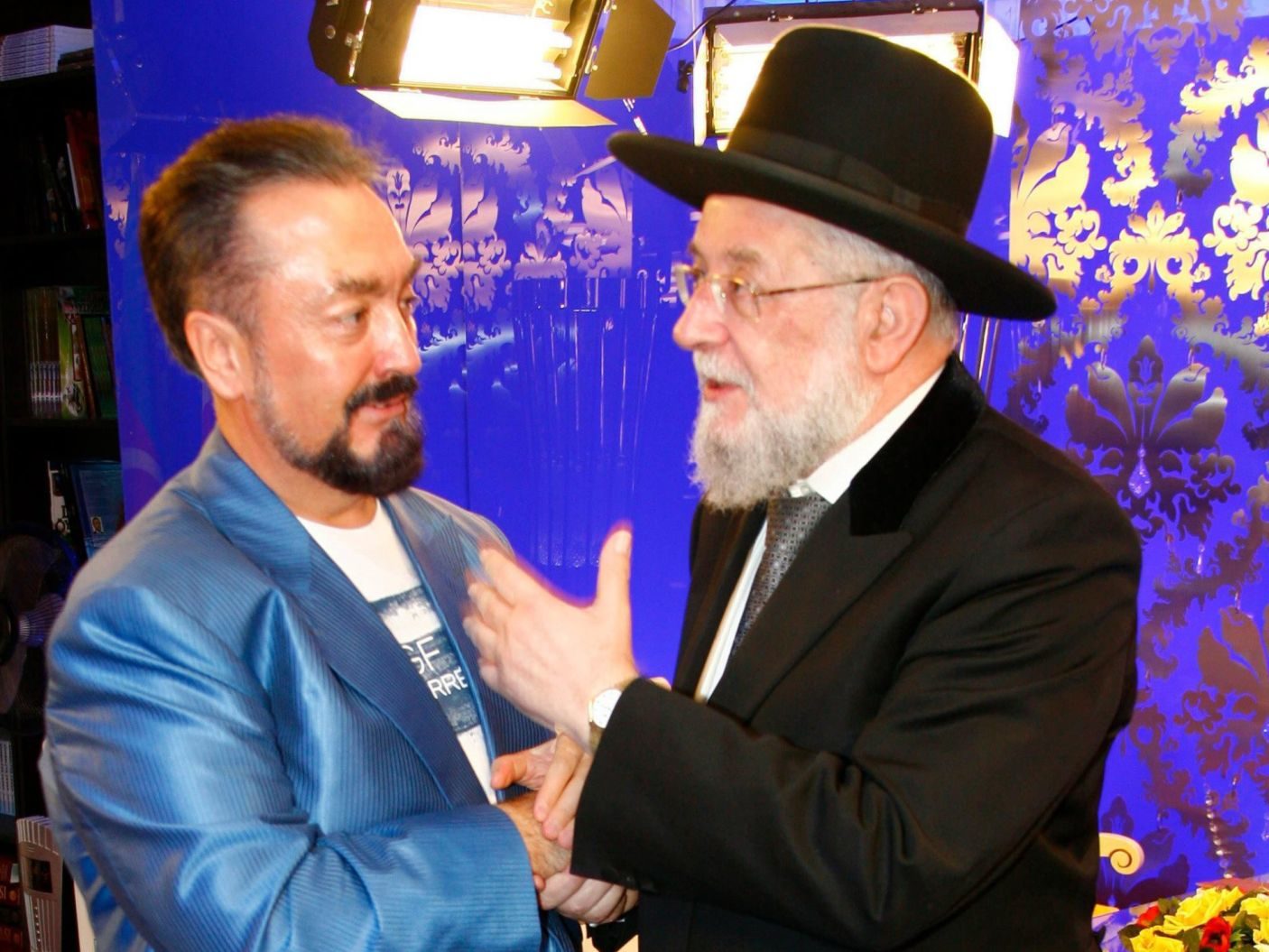 Click to enlarge Oktar with Rabbi Meir Lau.