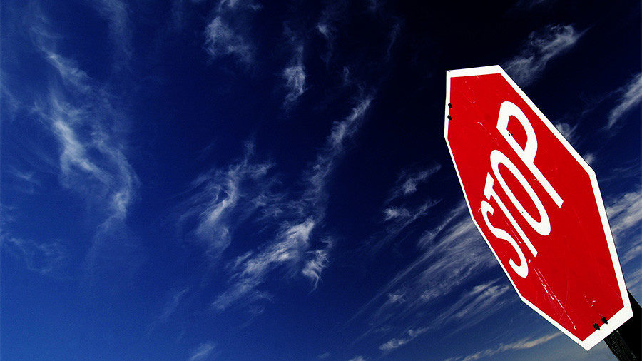 Click to enlarge Stop sign and sky