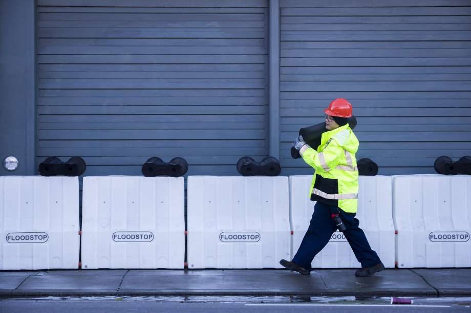 Major storm brings flood barriers to SF, closes campsites, could rain out Giants