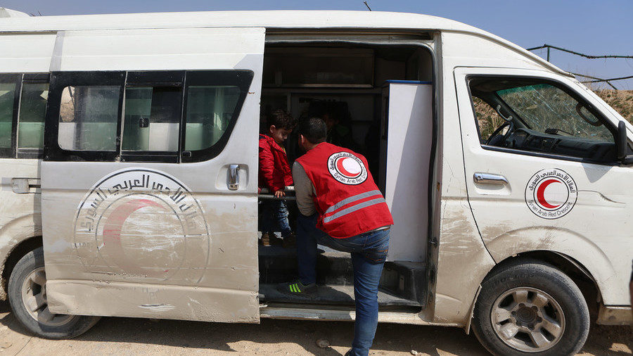 A Syrian Arab Red Crescent volunteer