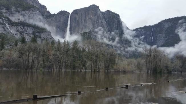 In this Saturday, April 7, 2018 photo released by the National Park Service, floodwaters cover Cooks Meadow