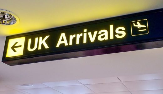 UK airport arrival sign
