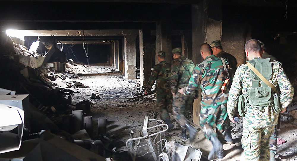 Click to enlarge Pro government forces check tunnels