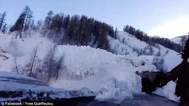 The snow fell for several minutes down the mountainside in Tignes, France on Tuesday