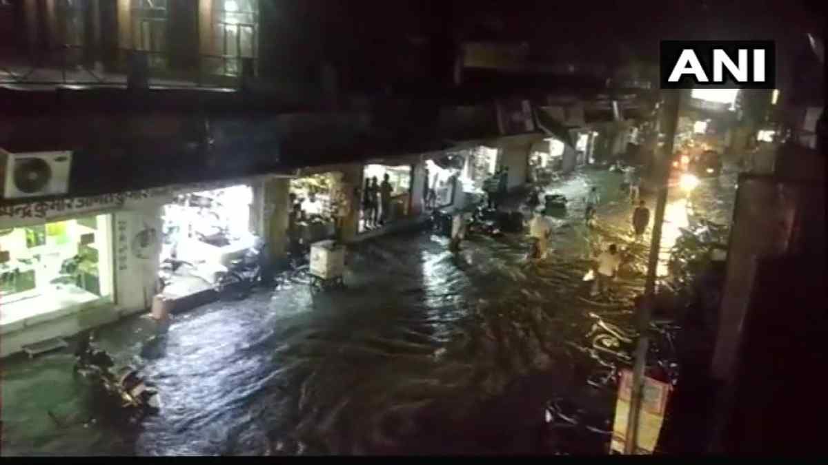 Click to enlarge Commuters were trapped for hours on the roads due to water-logging caused by the hailstorm.