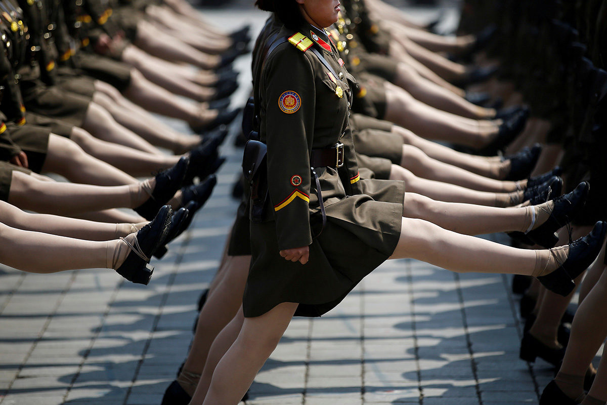woman soldiers march