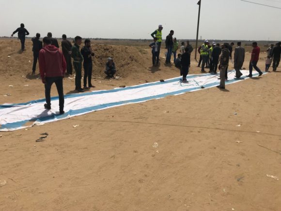 Israeli flag Gaza border protest