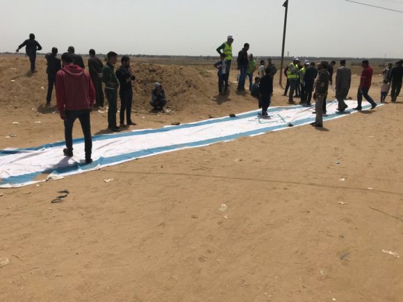 Click to enlarge Israeli flag Gaza border protest