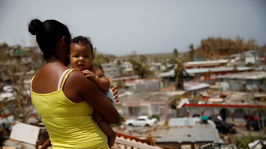 Click to enlarge Woman holding baby