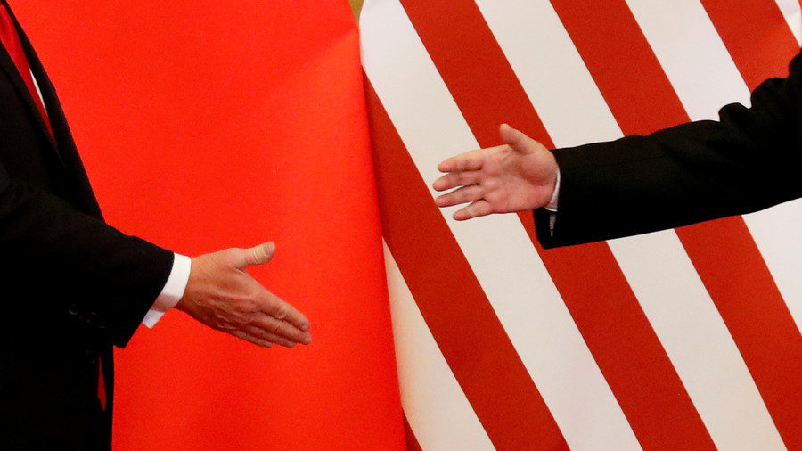 Click to enlarge U.S. President Donald Trump and China's President Xi Jinping shake hands after making joint statements at the Great Hall of the People in Beijing, China, November 9, 2017