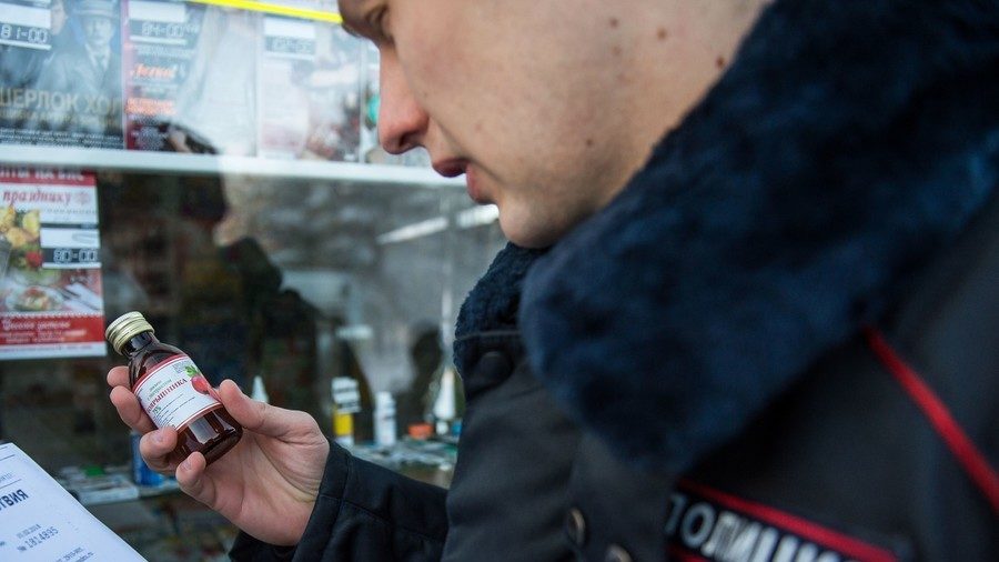 Click to enlarge Russian police inspect alcohol products