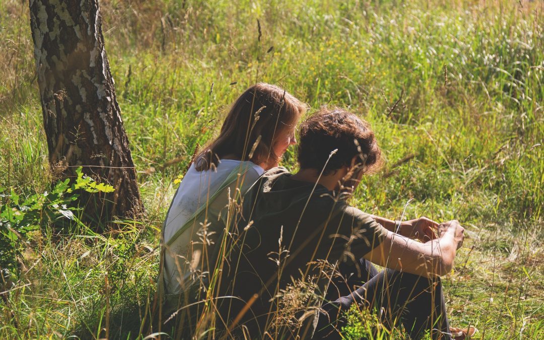guy and girl in field