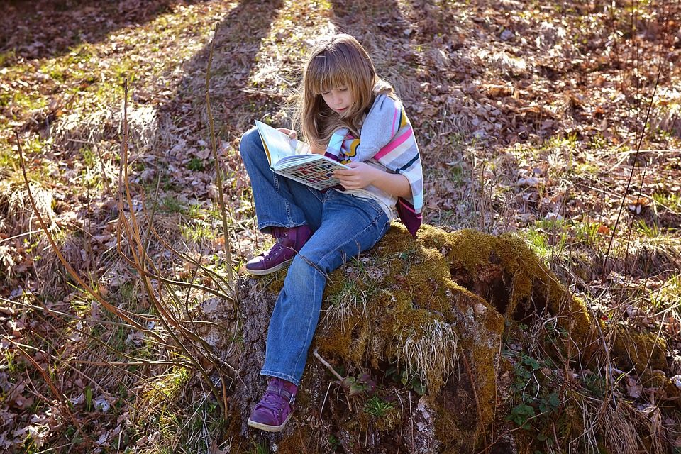 Click to enlarge girl reading