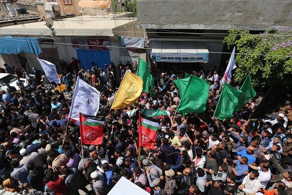 Palestinians attend the funeral ceremon