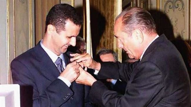 Click to enlarge EX-French president, Jacques Chirac (R), and Syrian President Bashar al-Assad