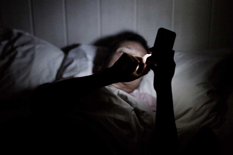 cellphone in bed