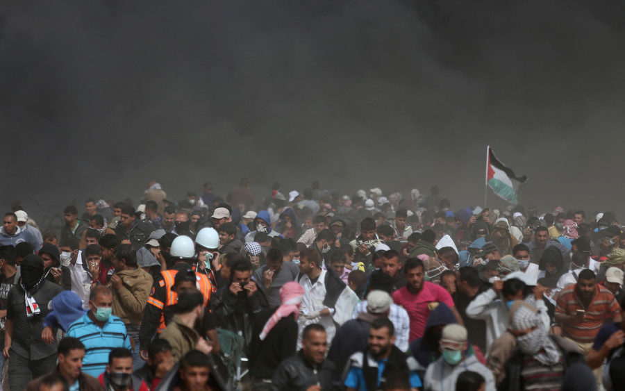 Palestinians run for cover