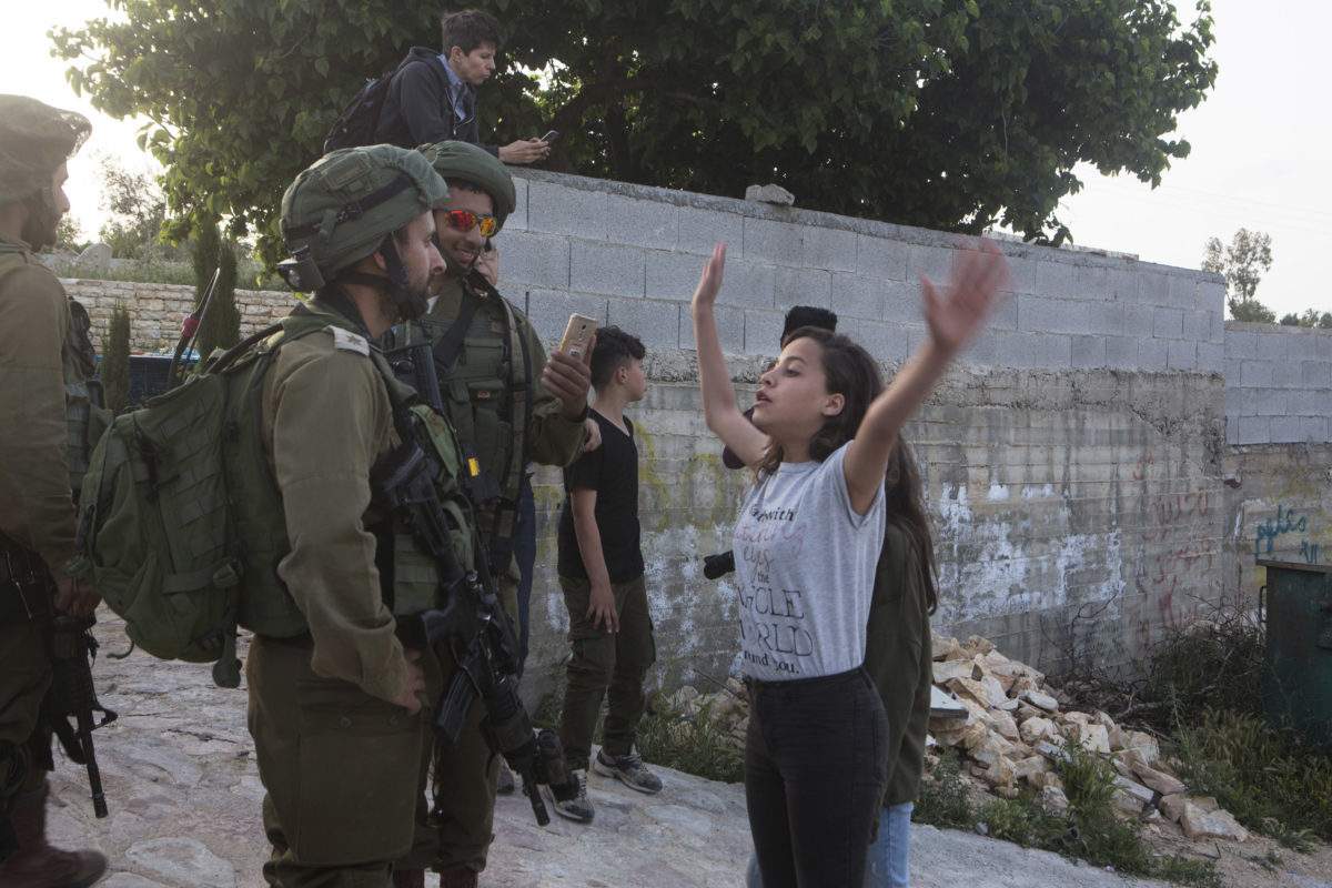 Click to enlarge Belal Tamimi israel soldier