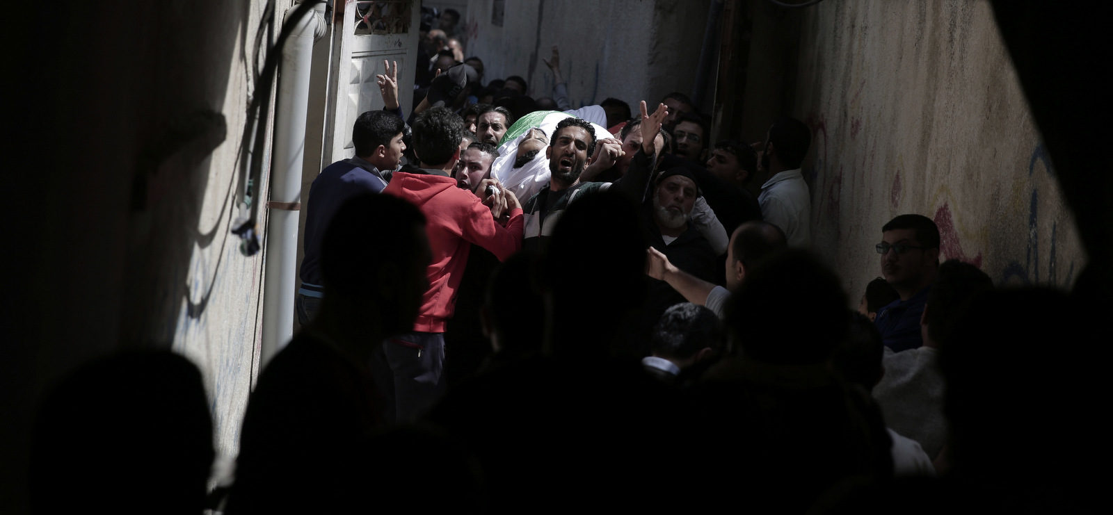 Click to enlarge Relatives of a Palestinian Iman