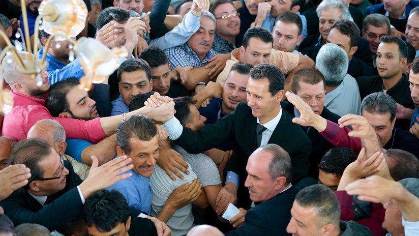 Assad con partidarios