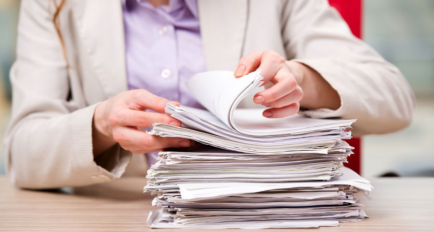 science studies stack of papers