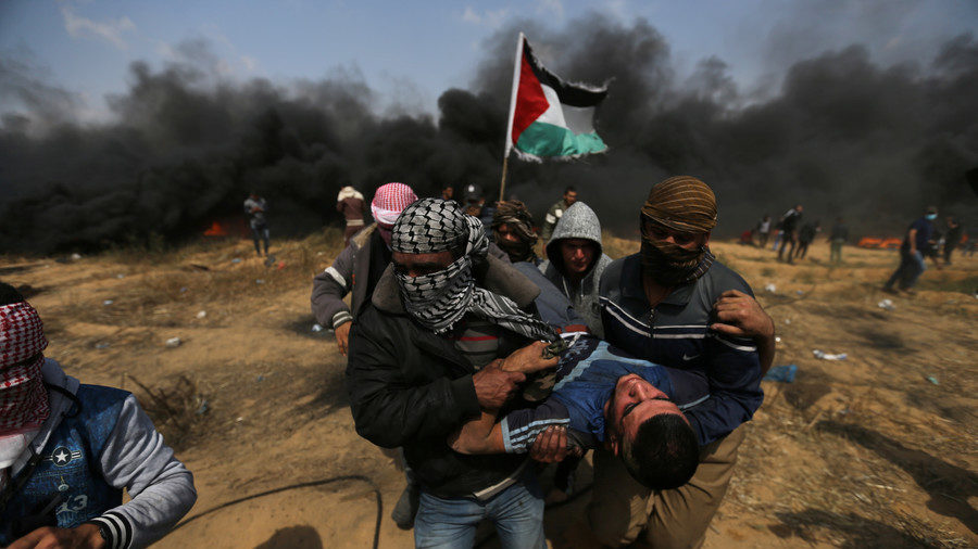 Click to enlarge A wounded demonstrator
