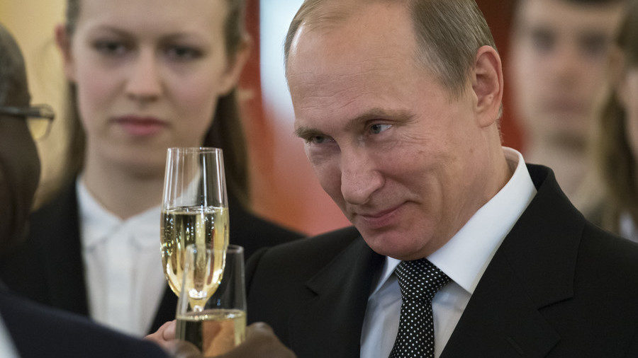 Click to enlarge Putin cheers