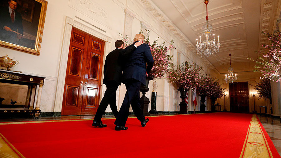 Click to enlarge Trump (R) and French President Emmanuel Macron