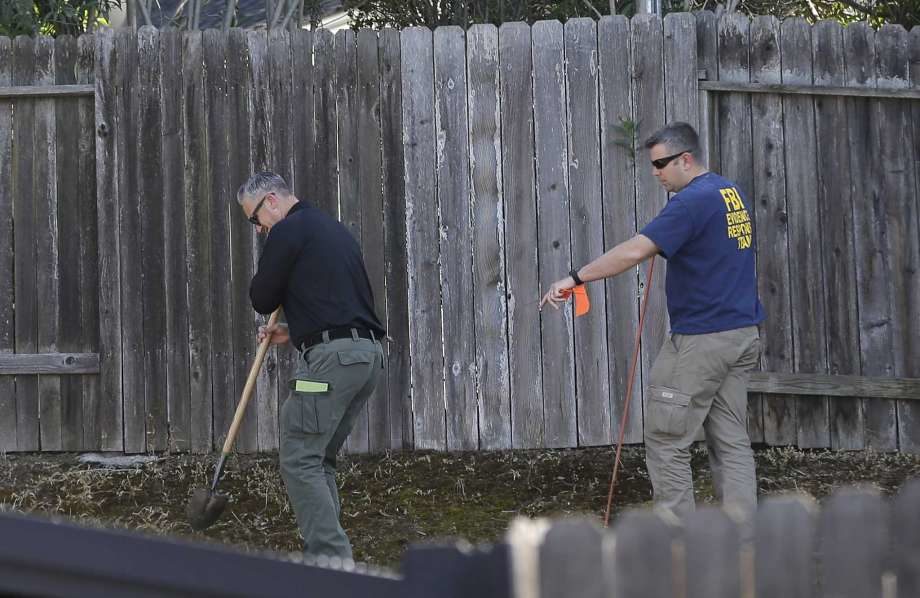 Click to enlarge police digging