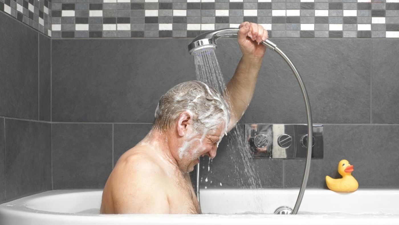showering man