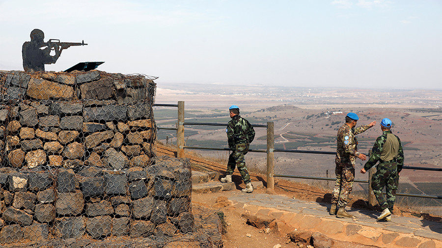 FILE PHOTO: UN peacekeepers patrol Mount Bental in the Golan Heights on October 23, 2017.