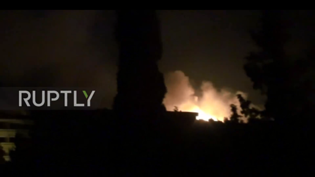 Screen shot from a footage showing large explosion at a Syrian military base in the province of Hama