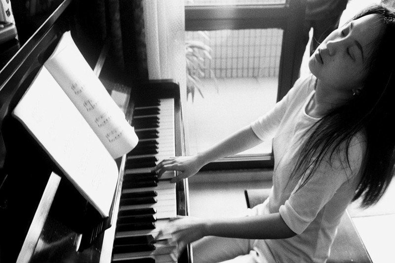 Click to enlarge playing piano