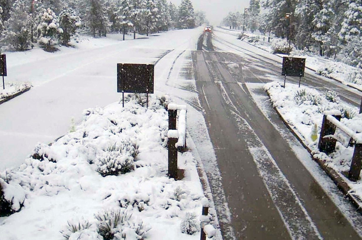 Click to enlarge A remote camera at the south gate entrance at the Grand Canyon National Park, Ariz., shows a fresh dusting of snow.