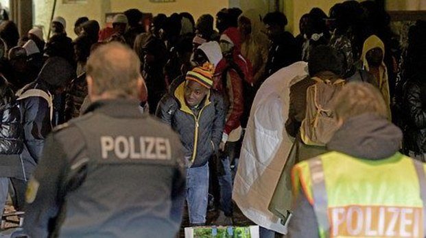 Rejected asylum seekers face police officers in Germany