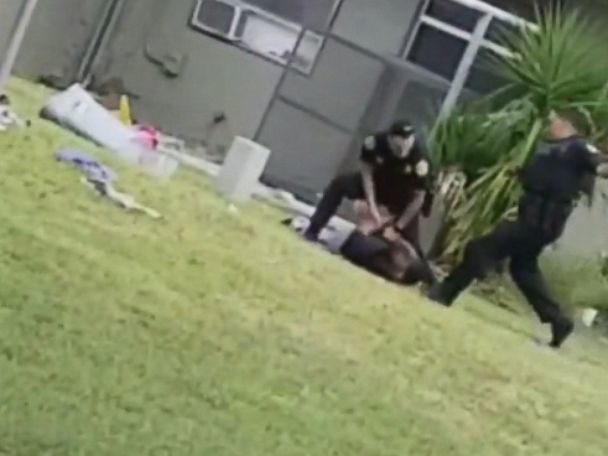 cop kicking man head