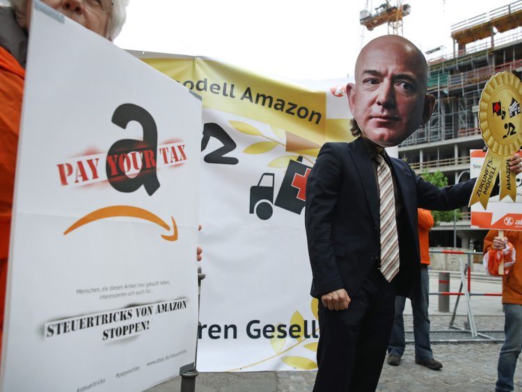 Protest germany amazon bezos