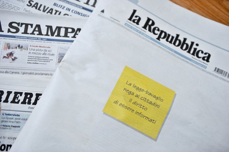 Click to enlarge Front pages of Italian newspapers calling for the defense of press freedom.