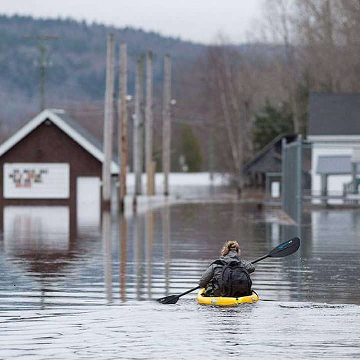 Click to enlarge Darlings Island, N.B., where the Kennebecasis River has flooded the only road into the community.