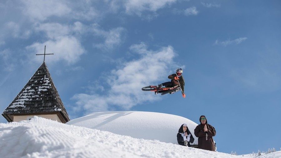 Click to enlarge Cyclist on ski slope