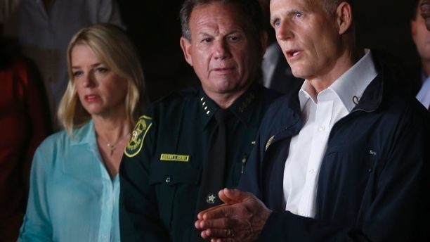 Click to enlarge Sheriff Scott Israel, Florida Governor Rick Scott.