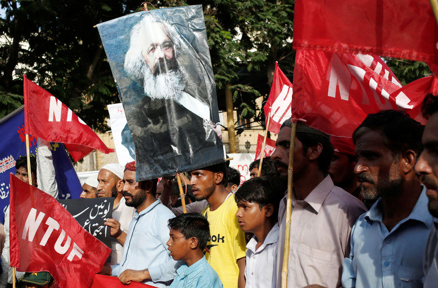 Click to enlarge Activists take part in a rally calling for better working conditions in Karachi, Pakistan, on May 1, 2018.