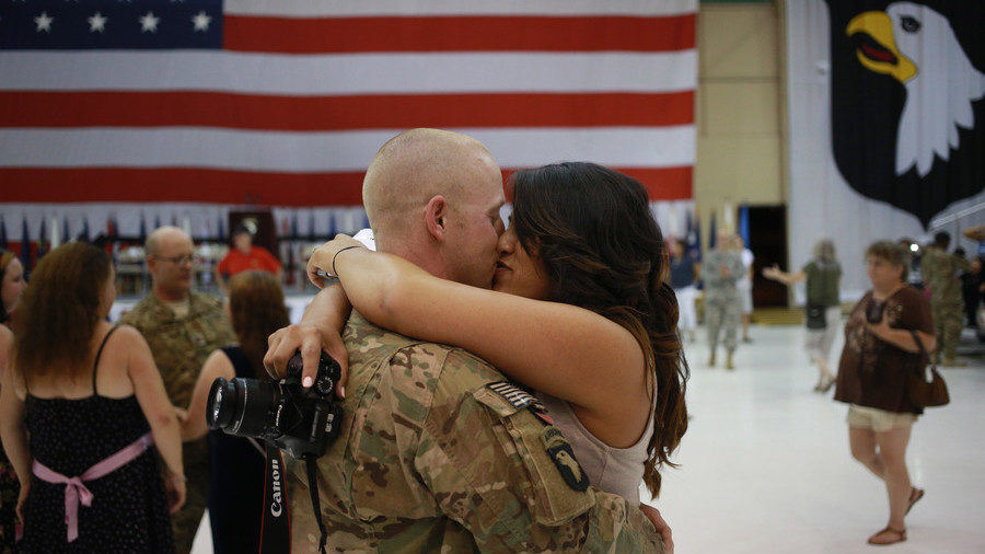 soldier kissing woman