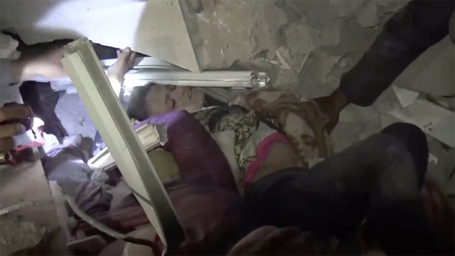 Yemeni child trapped under piles of rubble